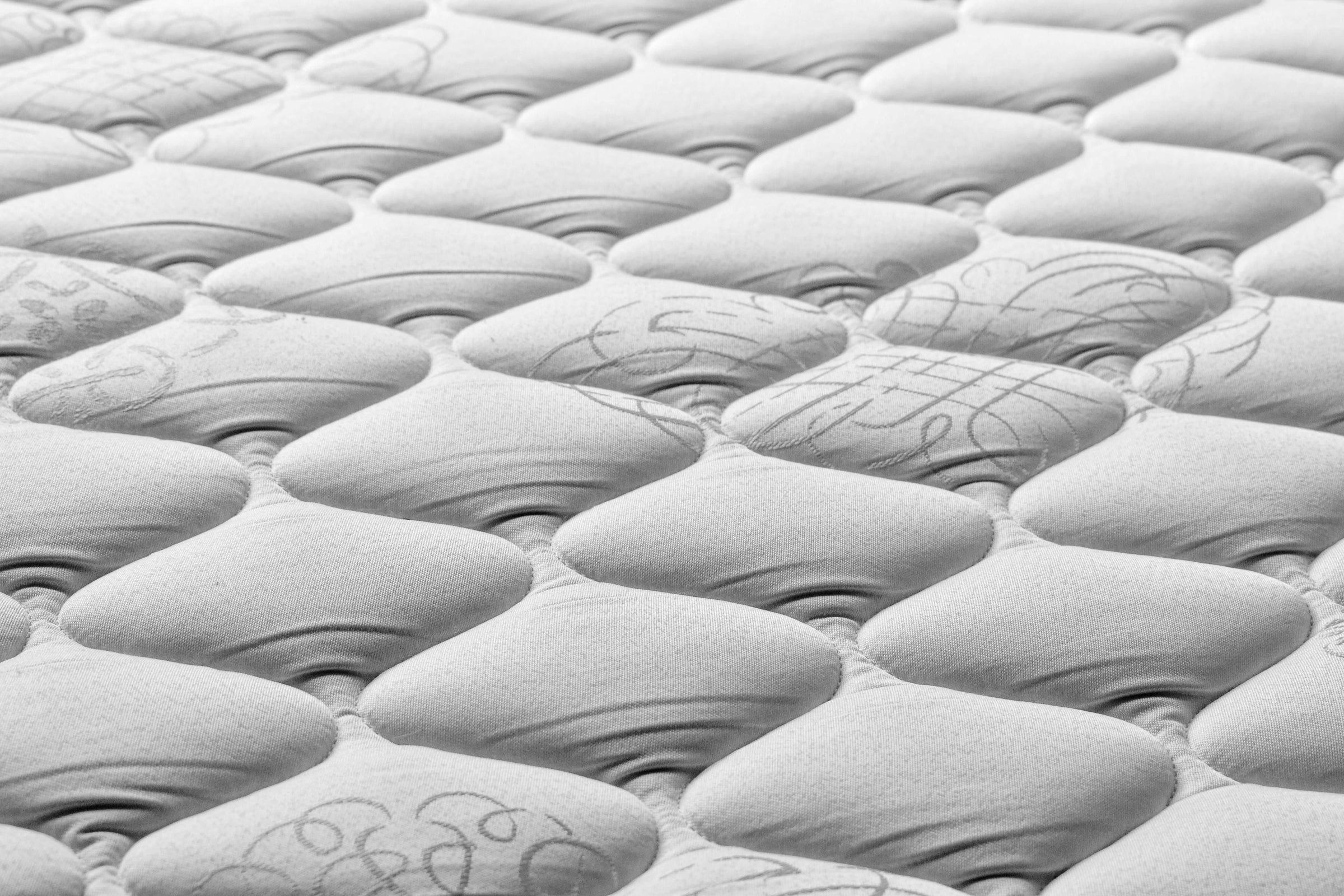 High-quality mattress surface pattern offering comfort and support for restful nights, available at affordable prices.