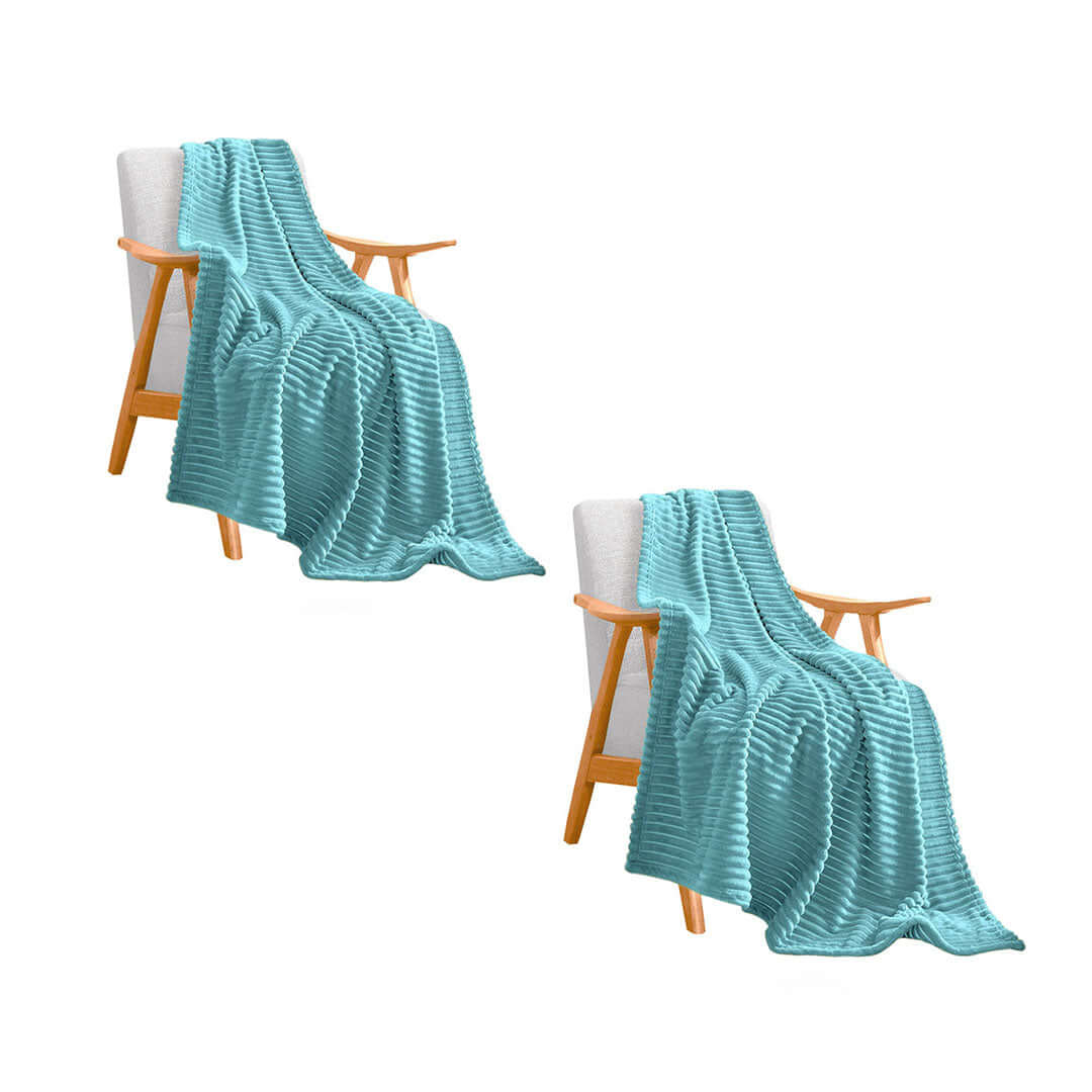 Affordable homewares - Two teal blankets over wooden chairs delivering quality and value furniture pieces.