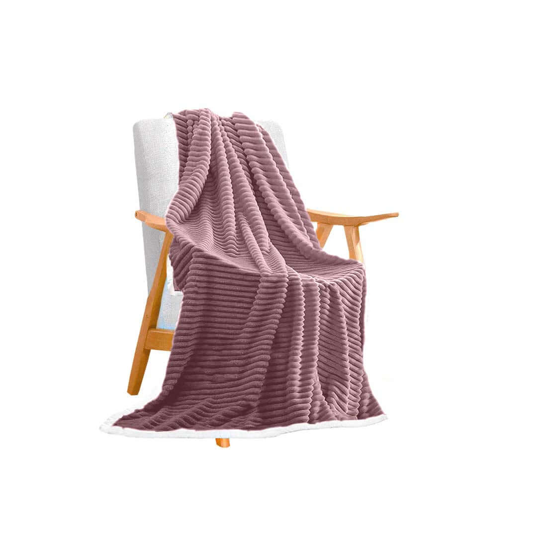 Affordable quality homewares - cozy taupe blanket draped over wooden armchair, creating value furniture decor.