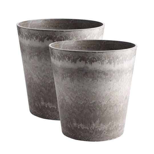 Two affordable, quality homeware concrete planters offering great value furniture for modern interior decor.