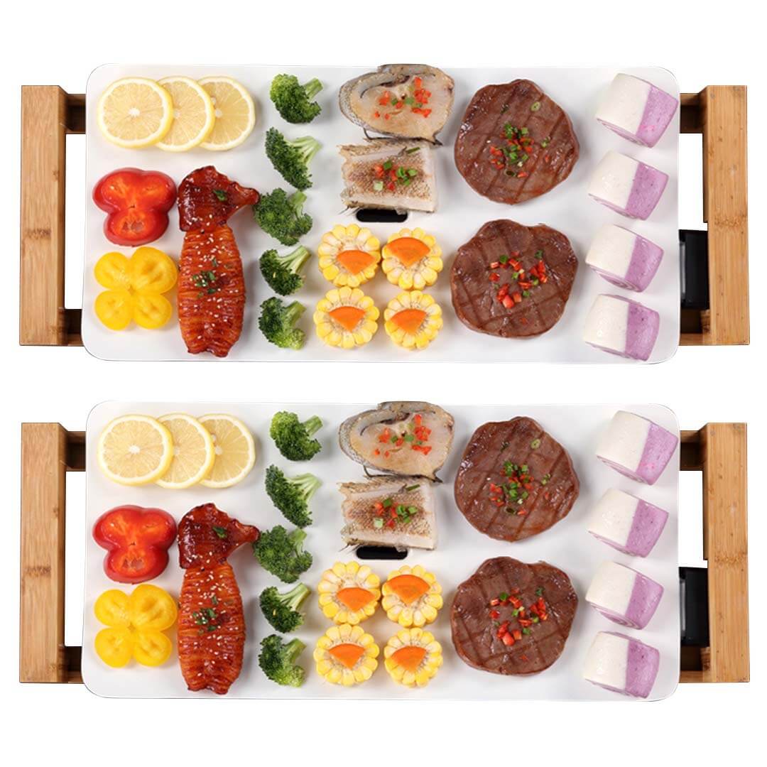 Assortment of colorful, high-quality prepared foods presented on two wooden trays