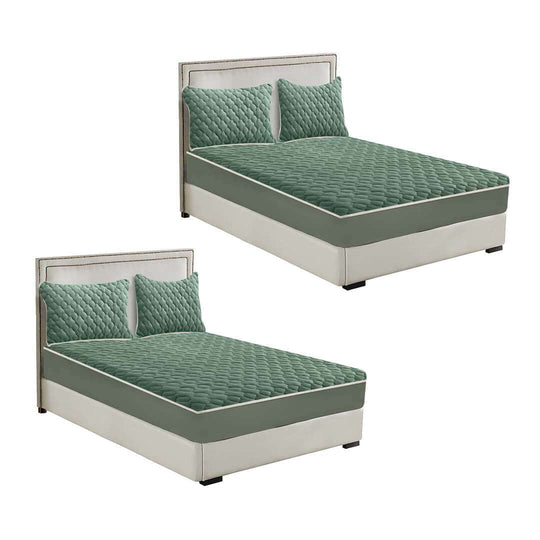 Affordable quality value furniture - twin green quilted upholstered beds.