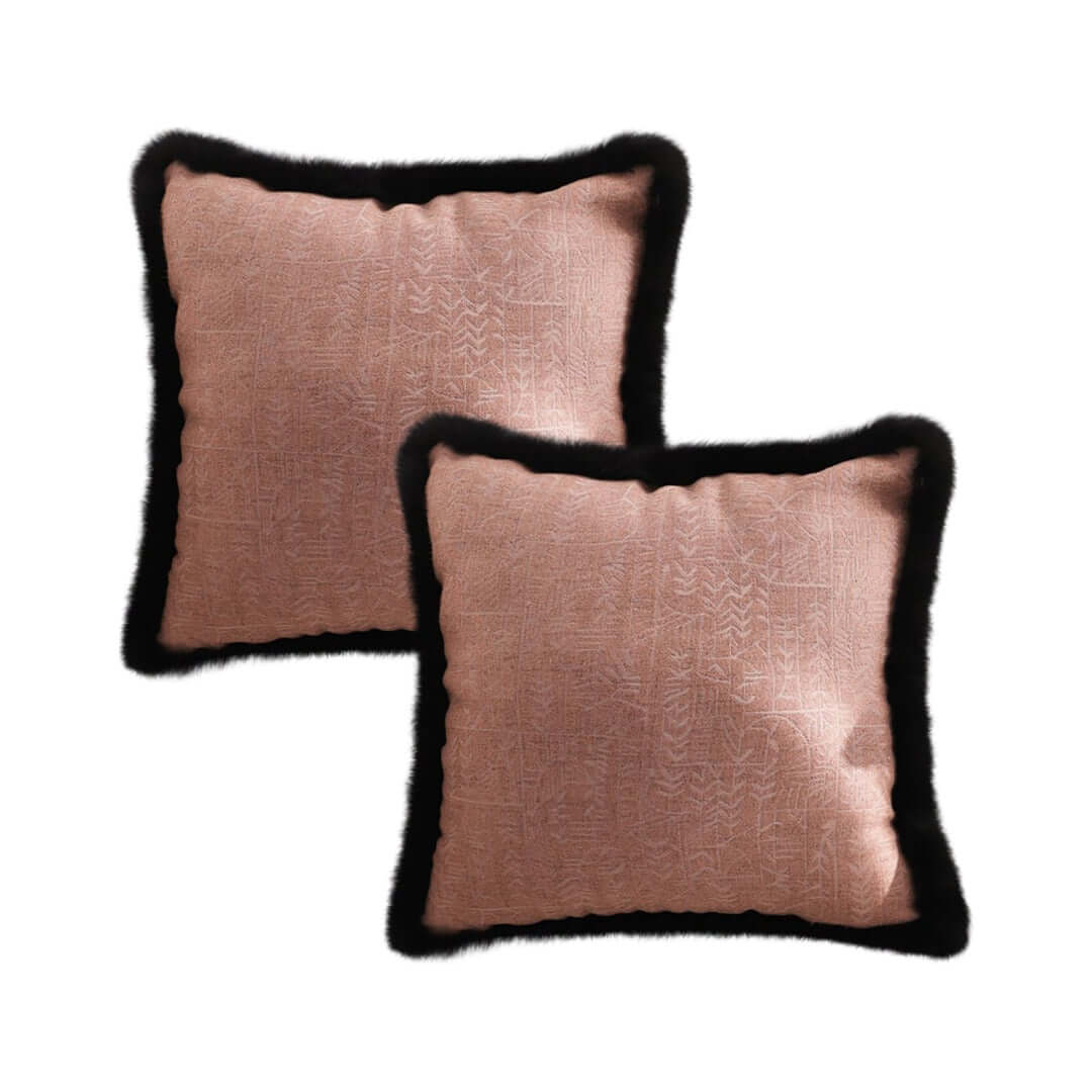 Affordable quality homewares - two pink pillows with black trim for value furniture addition.