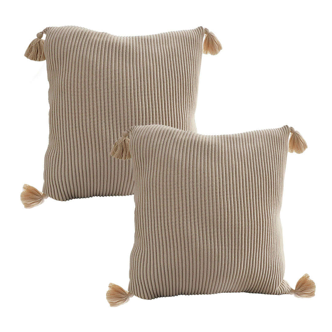 Affordable quality homewares beige throw pillows with tassels, perfect for value furniture and home décor.