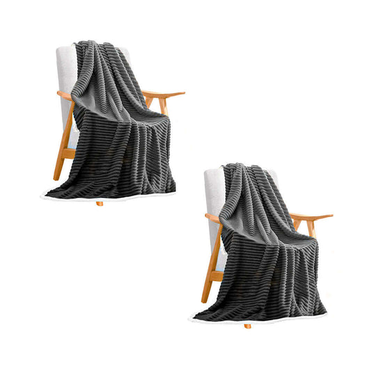 Two wooden chairs with cozy black and gray striped throws, showcasing affordable, quality homewares and value furniture.