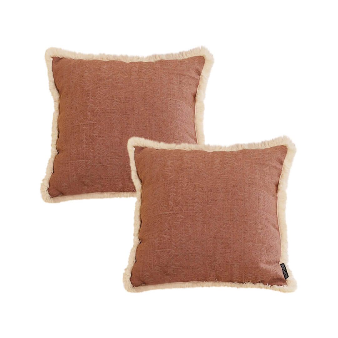 Affordable quality homewares - two pink decorative cushions with white fur trim for value furniture.