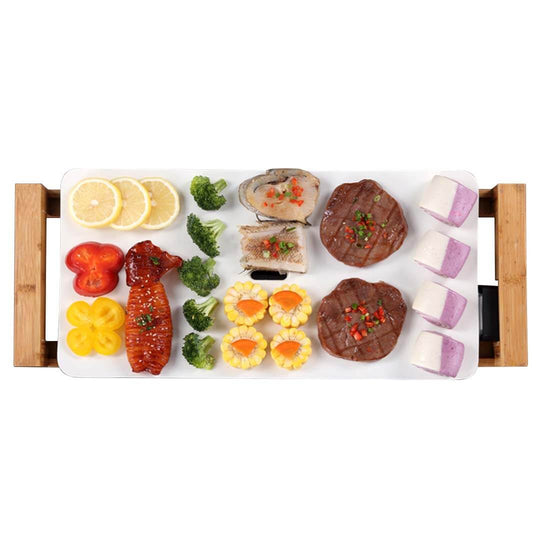 Assorted gourmet dishes displayed on a tray with bamboo handles