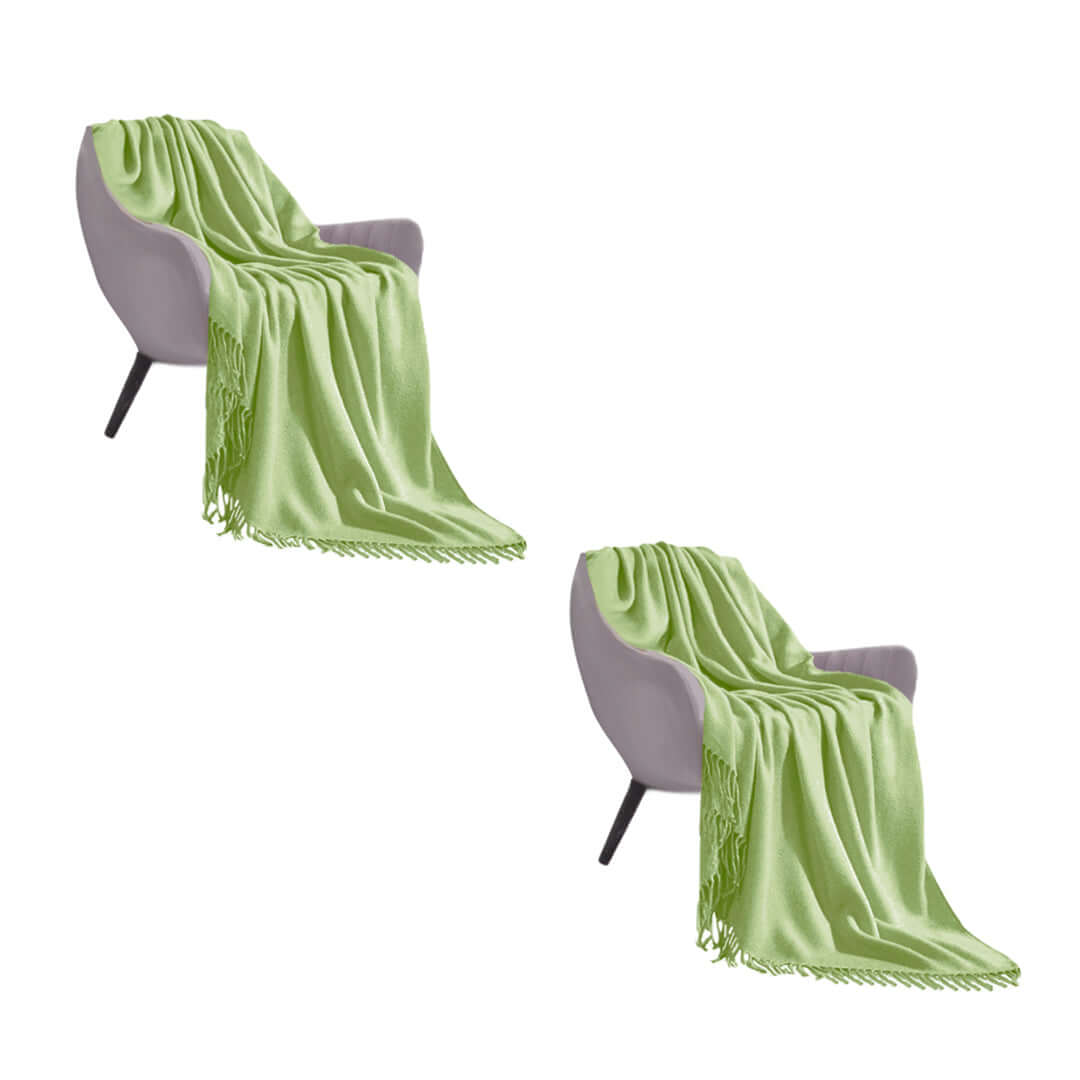 Affordable quality homewares - Stylish chair with green blanket offering value furniture.