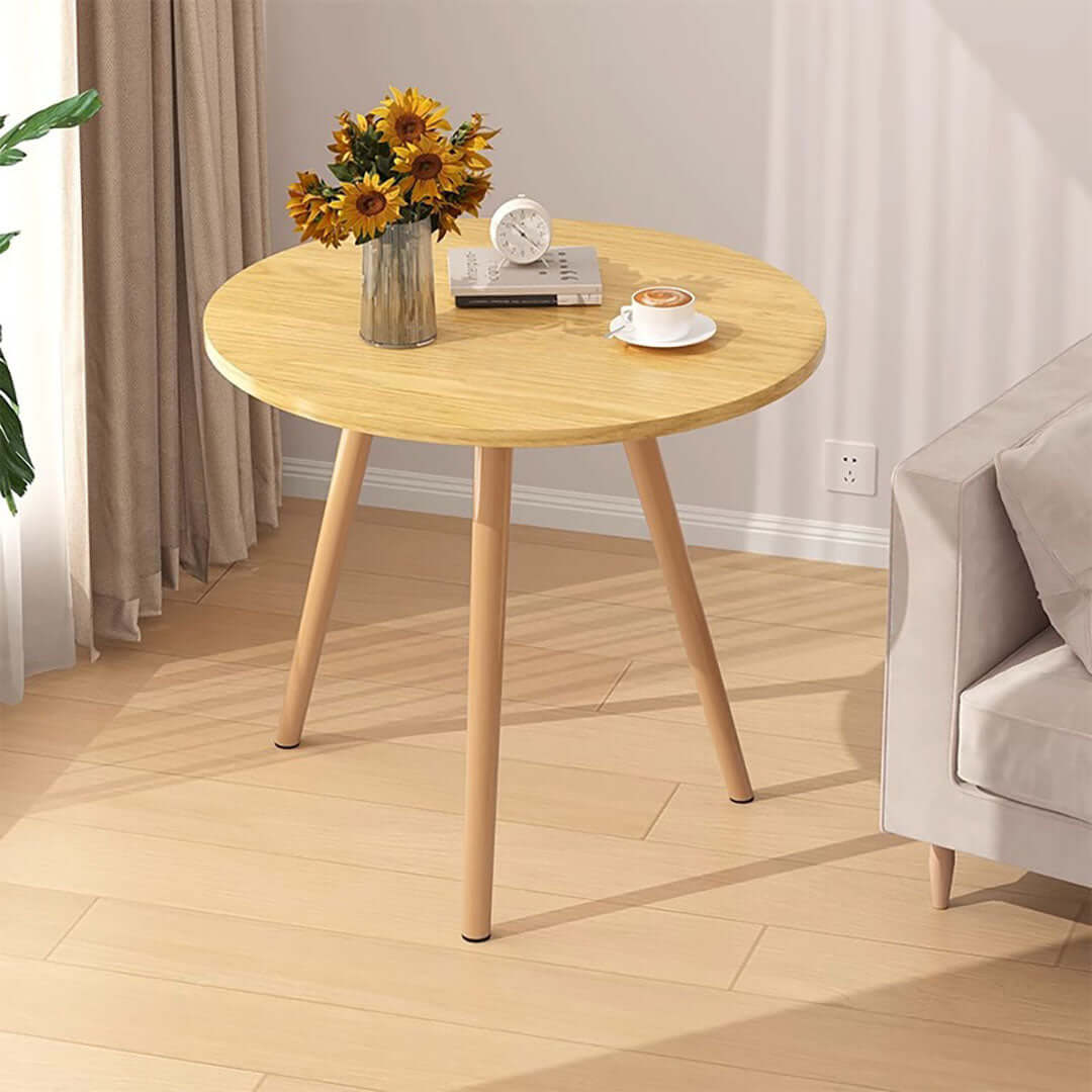 Affordable quality round wooden table with sunflowers vase, providing value homewares and stylish furniture for any room.