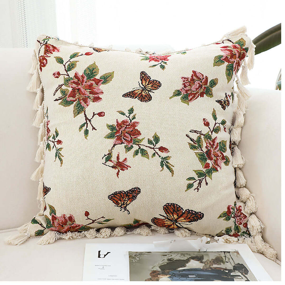 Floral and butterfly patterned cushion with tassels, perfect for adding affordable, quality homewares and value furniture to your living space