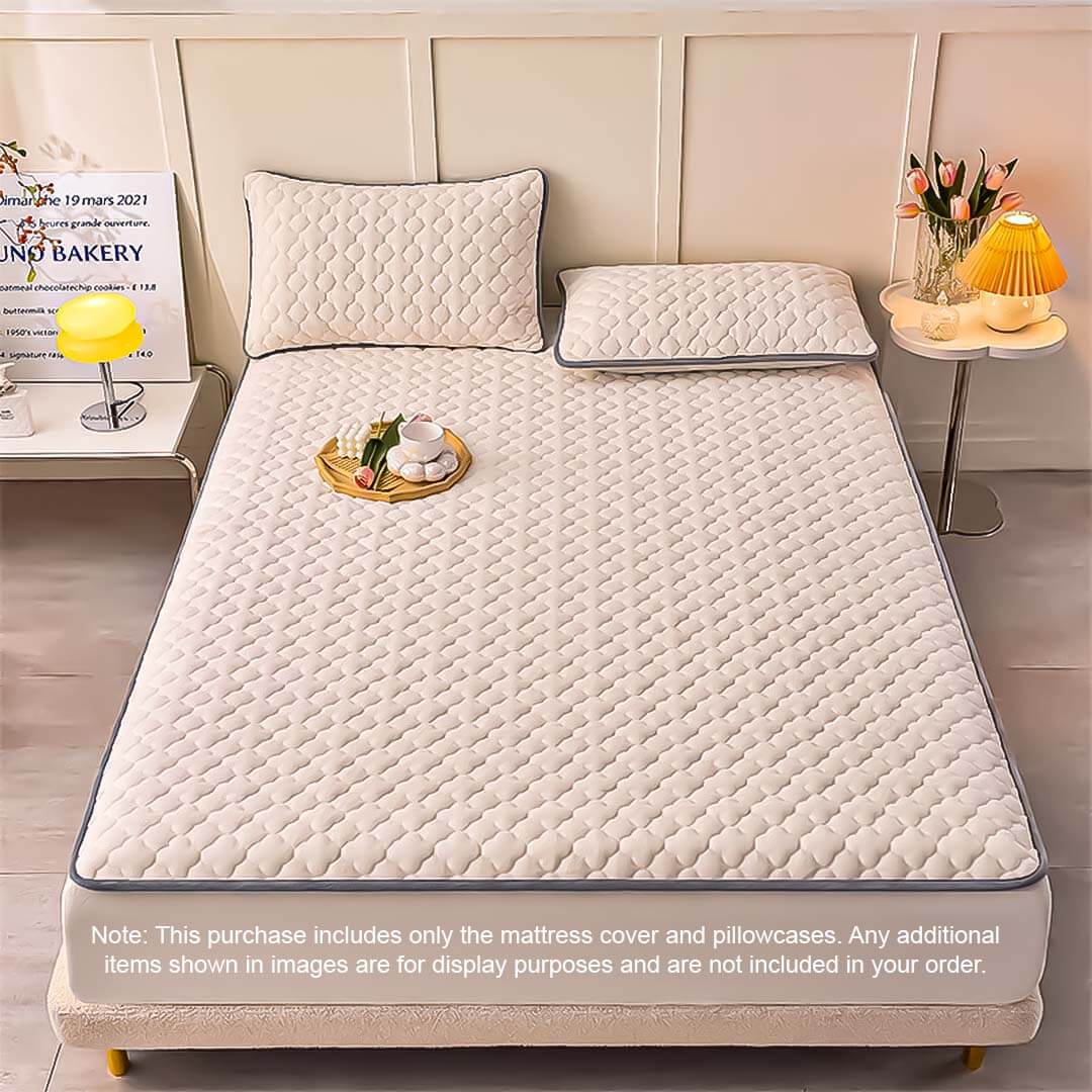 Affordable quality homewares - value furniture mattress cover and pillowcases set on a bed in a cozy bedroom setup.