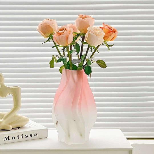 Elegant pink and white vase with roses, showcasing affordable, quality homewares and value furniture.