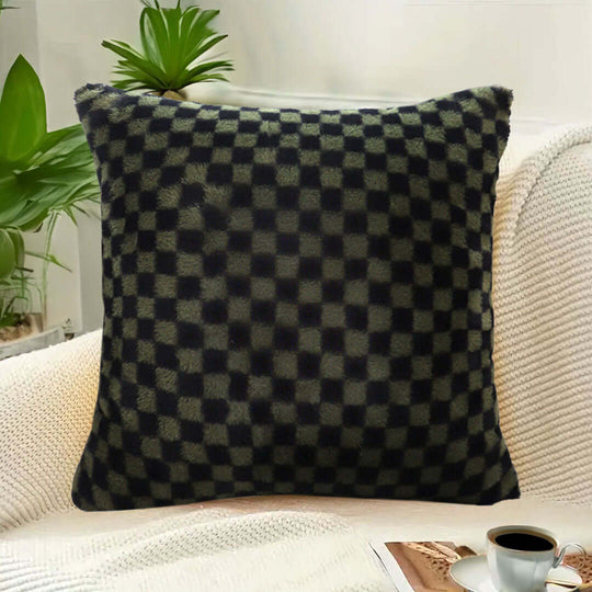 Affordable checkered-pattern pillow on cozy armchair, showcasing quality homewares and value furniture.