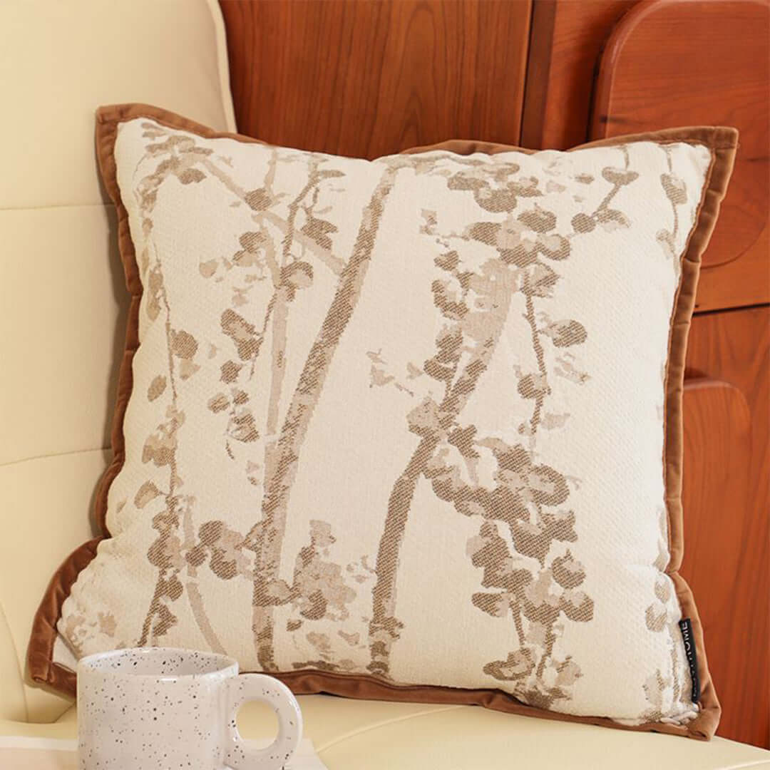 Affordable quality homeware with decorative pillow on cream chair, perfect value furniture accessory for any room.