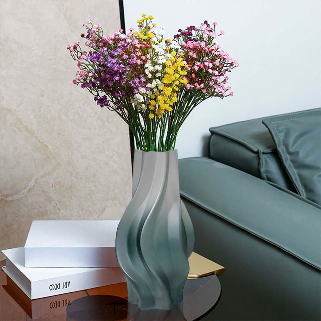 Affordable quality homewares - colorful flowers in a stylish vase on a coffee table next to a sofa, adding value furniture ambiance to your home.