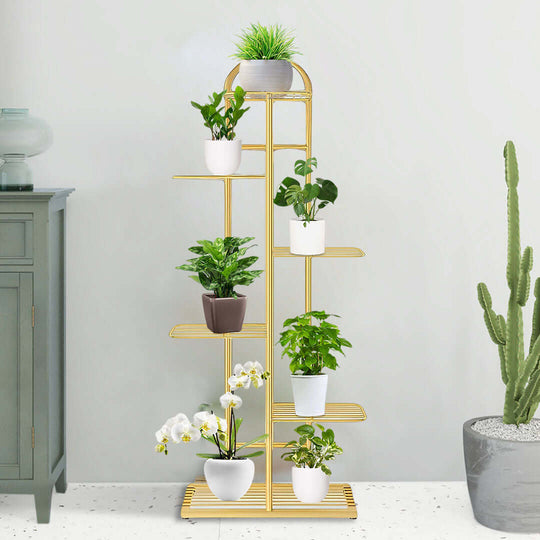 Elegant gold plant stand holding various potted plants, showcasing affordable and quality homewares for enhancing indoor spaces