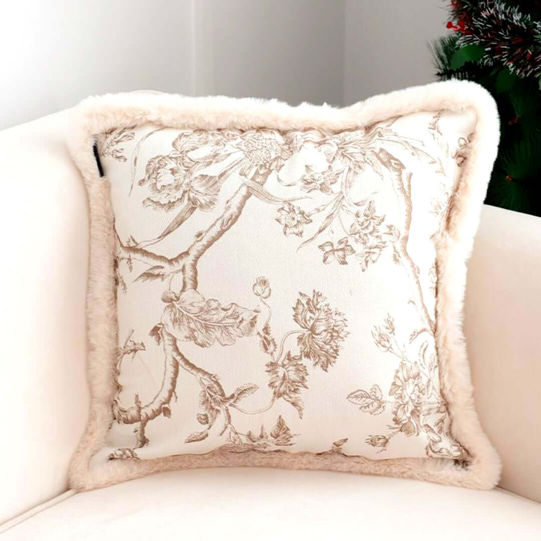 Affordable quality homewares - Decorative cushion with floral pattern and soft fur trim on a beige sofa, value furniture.