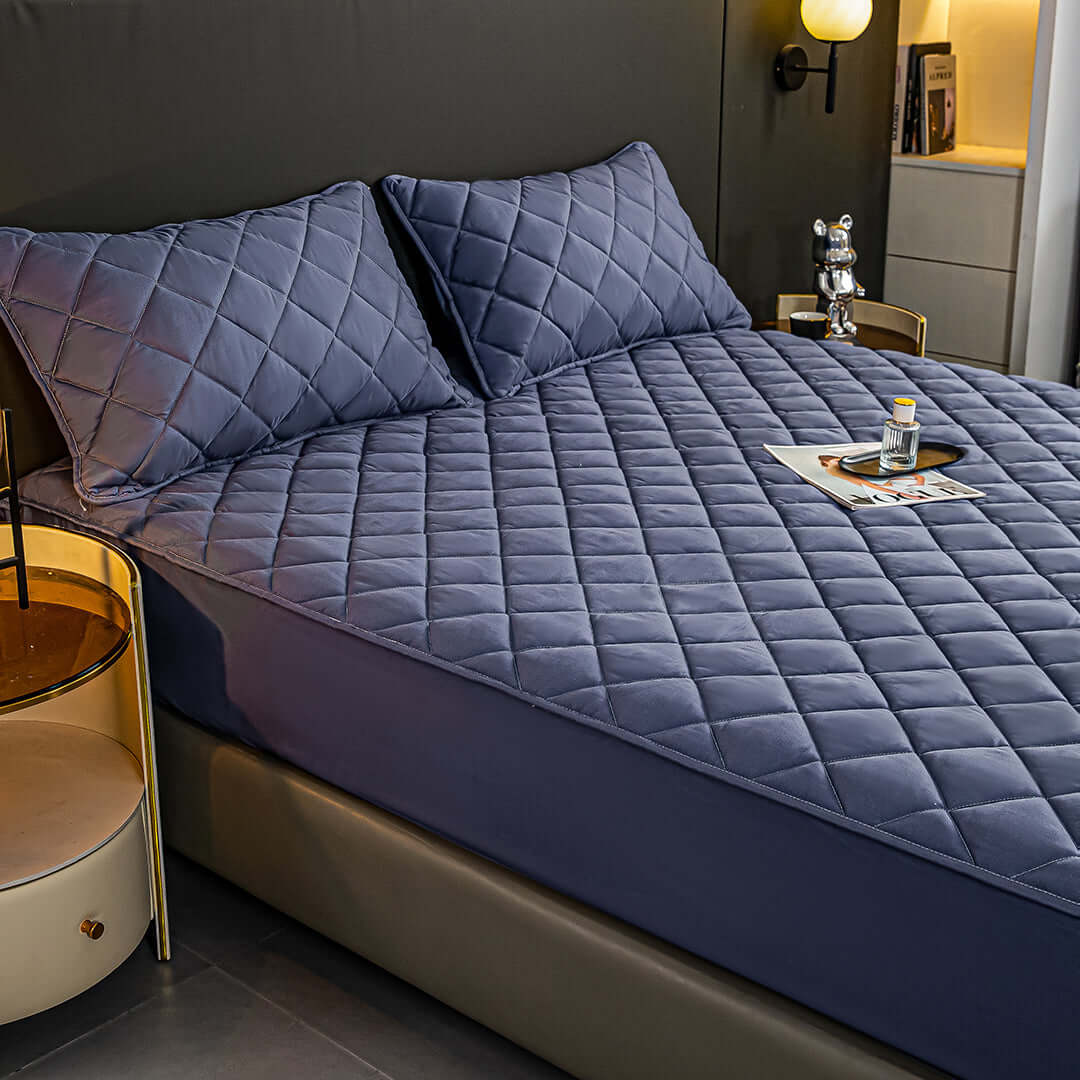 Affordable high-quality quilted bedding set on a modern bed in a cozy bedroom showing value furniture and homewares.