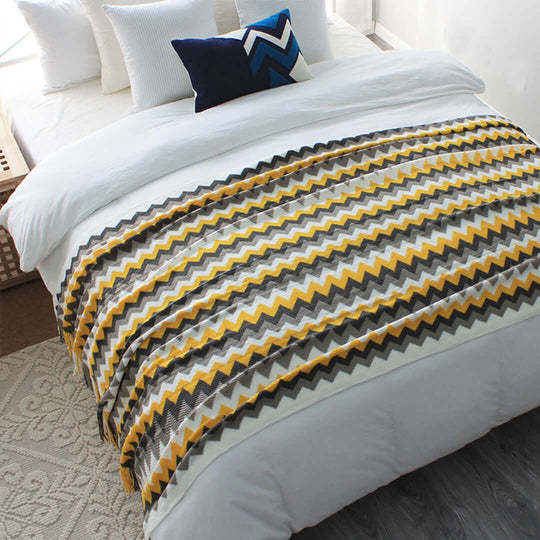 Affordable quality homewares with a stylish zigzag pattern bedspread showcasing value furniture and cozy bedroom decor.