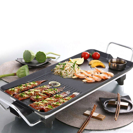 Affordable quality homewares - Electric grill with various foods including shrimp, vegetables, and meat skewers - Value furniture kitchenware.