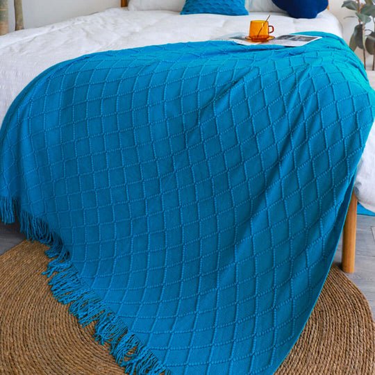 Affordable quality homewares - vibrant blue throw blanket draped over a bed, enhancing value furniture with style.