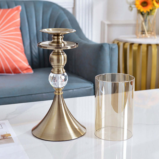 Affordable quality homewares - elegant brass candlestick holder on modern living room coffee table. Value furniture and stylish decor.