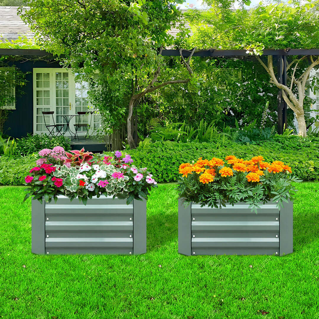 Affordable quality homewares value furniture garden planters with vibrant flowers in a lush backyard setting.