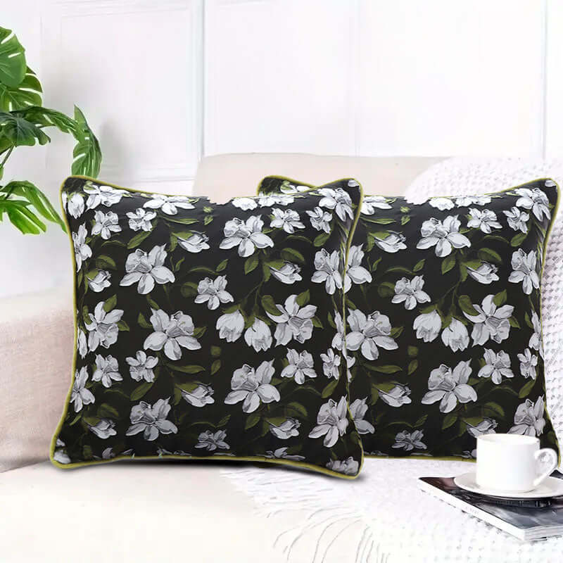 Floral black and white cushion set on a chic white sofa, perfect for affordable quality homewares and value furniture enhancement.