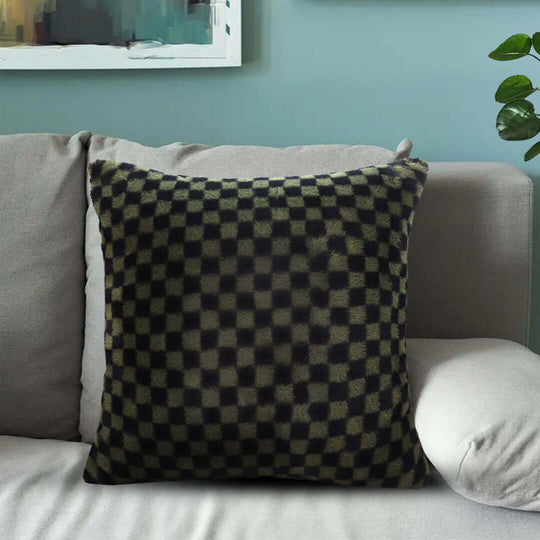 Affordable checkered cushion on a gray sofa in a modern living room, ideal homeware for adding quality and value furniture styles.