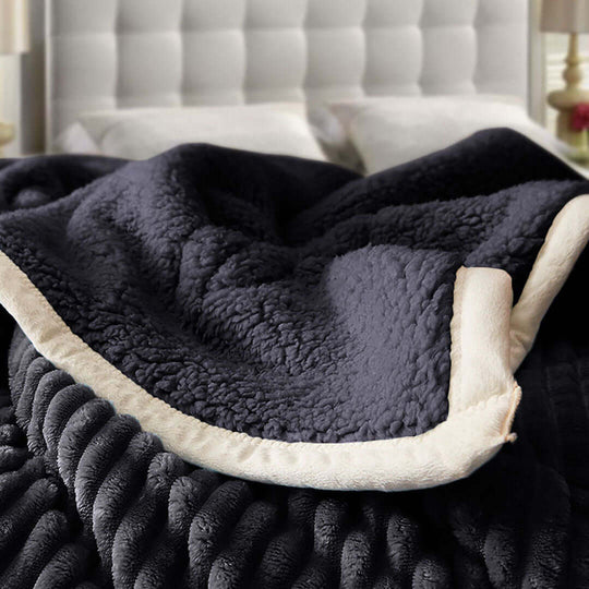 Cozy sherpa blanket on luxurious bed, showcasing high-quality and affordable homewares for value furniture.