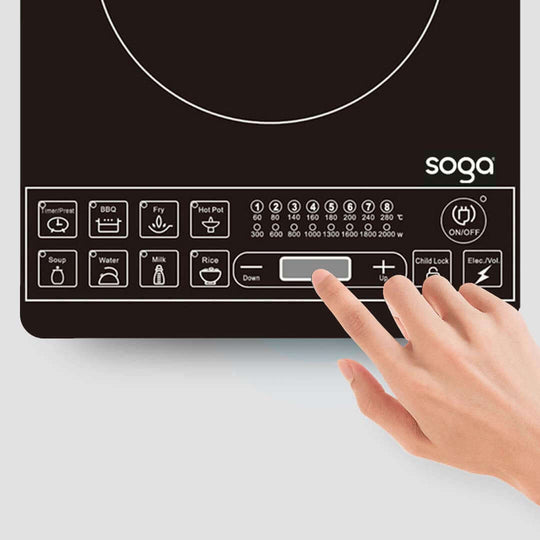 Hand interacting with Soga induction cooktop control panel featuring various cooking modes and safety functions.