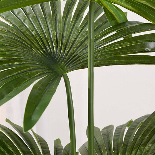 Lush green artificial palm leaves, bringing affordable quality and value to homewares and furniture decor.