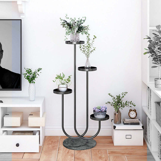 Affordable quality homewares featuring a modern plant stand showcasing five lush plants, designed for value furniture and interior decor.