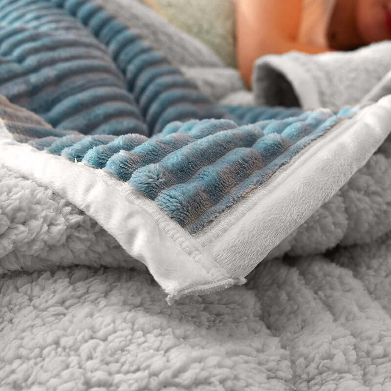 Close-up of a cozy blue and grey blanket, perfect for affordable, quality homewares and value furniture.