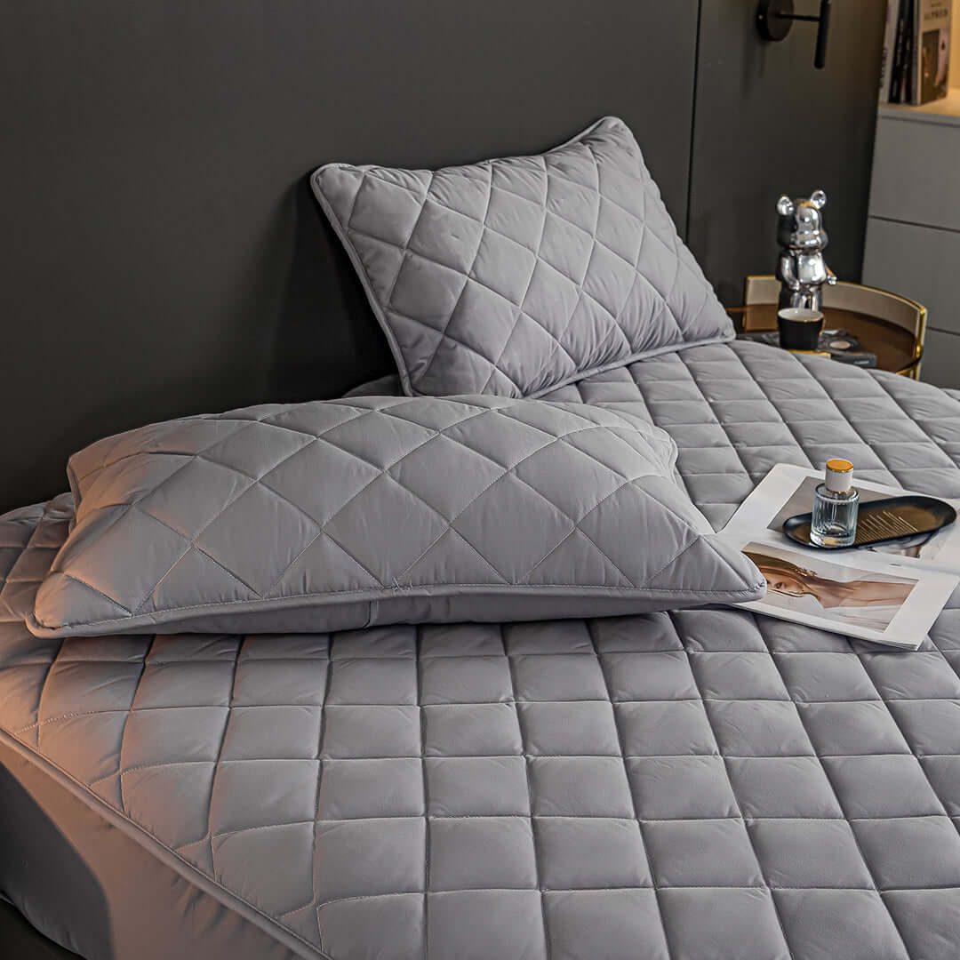 Affordable quality quilted bedding set offering value furniture for homewares with two matching pillows in elegant grey.