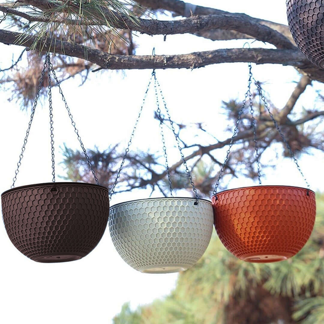 Affordable quality homewares - colorful hanging planters providing value furniture options for outdoor garden décor.