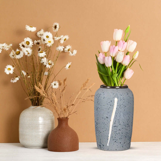 Stylish homeware vases with daisies and tulips, affordable quality and value furniture décor.