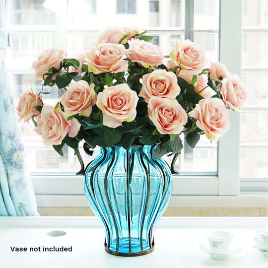 Pink roses arrangement in blue vase on windowsill – Vase not included