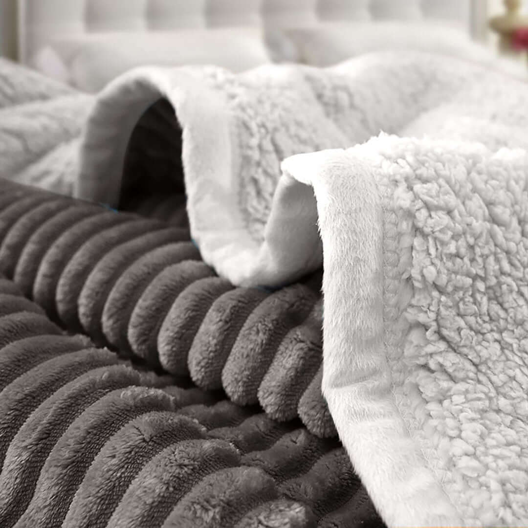 Quality affordable homewares - Soft and cozy value furniture blanket in black and white, ideal for a comfortable living space.