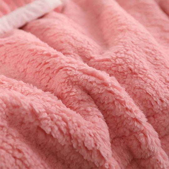 Soft pink faux fur blanket showcasing quality and affordable homewares for value furniture.