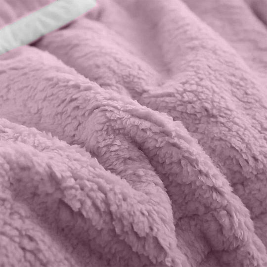 Cozy pink fleece blanket showcasing soft texture, perfect for affordable homewares and quality value furniture collections.