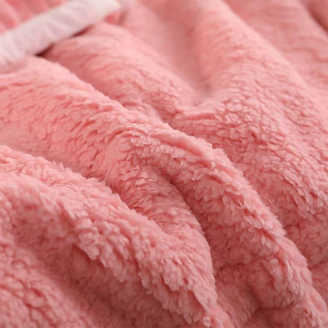 Affordable quality pink fluffy blanket showcasing soft texture and value furniture addition to homewares collection.