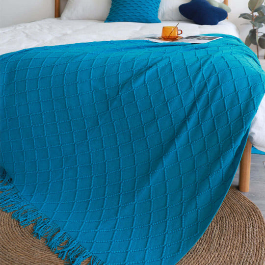 Affordable quality turquoise blanket on bed, showcasing value homewares and furniture