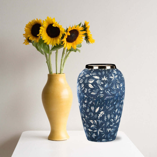 Affordable quality homewares showcasing a ceramic floral vase and a yellow vase with sunflowers, adding value furniture decor.