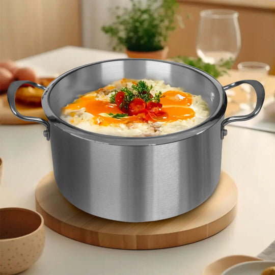 Stainless steel pot with cooked eggs and vegetables in a modern kitchen, showcasing affordable, quality homewares and value furniture.