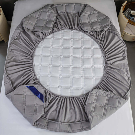 Affordable quality homewares and value furniture - grey and white circular quilted bedding set on display