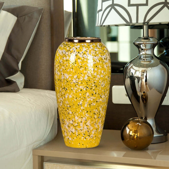 Affordable quality yellow vase on a nightstand beside a bed, enhancing home decor with value furniture and stylish homewares.