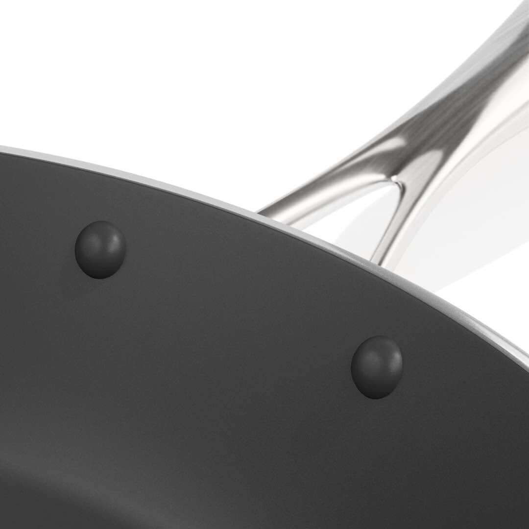 Close-up of a quality stainless steel frying pan, showcasing affordable and durable homewares for value-conscious shoppers.