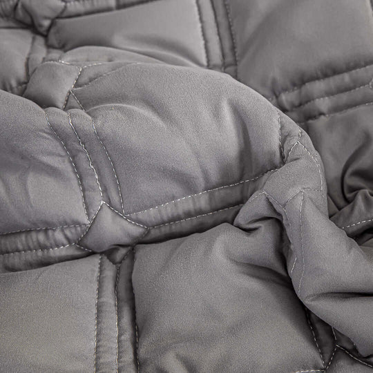 Soft grey quilted blanket showcasing affordable, quality homeware and value furniture.