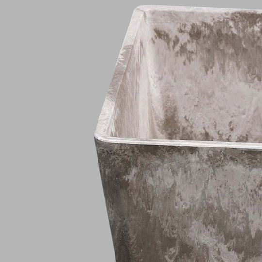 Close-up of quality, affordable concrete homeware with a textured finish for value furniture.